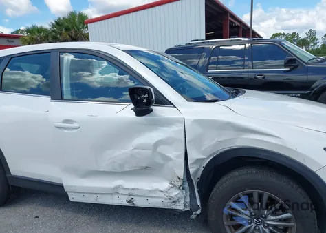 2021 Mazda Cx-5 Sport from USA, damaged, VIN JM3KFABM2M1305164